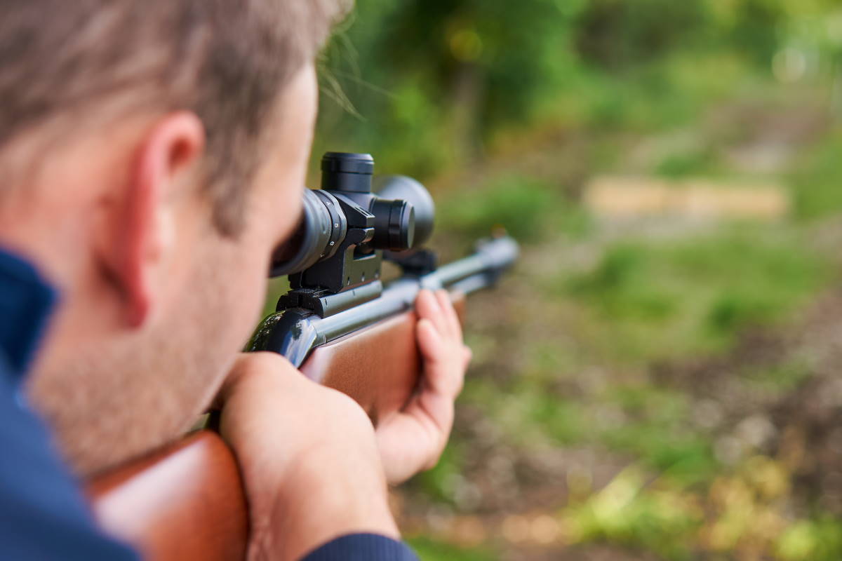 A man carrying an Air Gun.